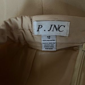 Woman’s vintage tan skirt calf length